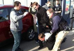 Police arrest Carl Anderson, owner of the Canadian Safe Cannabis Society Tuesday morning.